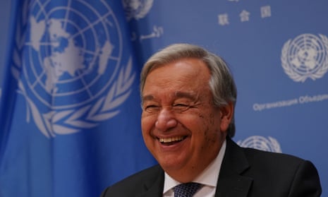 António Guterres attends a press briefing.
