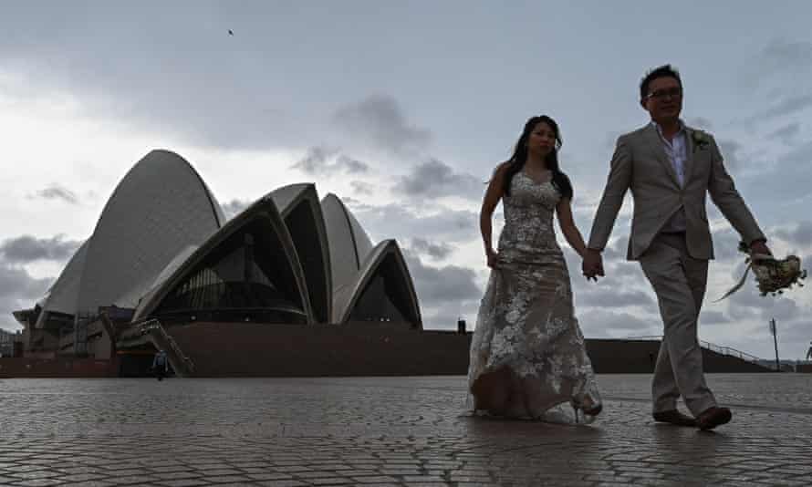 Couple with Sydney Opera House in background