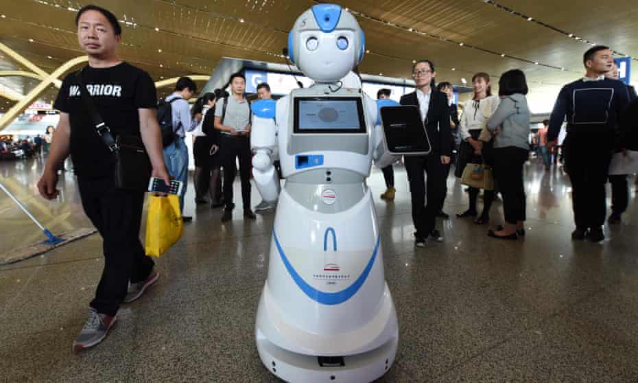A robot designed to answer passengers’ questions at Changshui International Airport, China. 