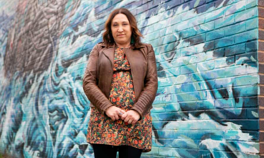 Council leader Janette Williamson  in front of a mural