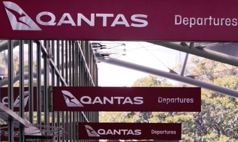 Qantas departures signage outside Sydney's domestic terminal