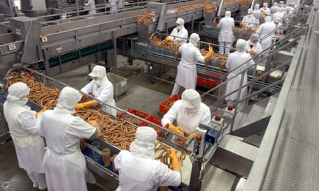 Processing sausages at a German plant