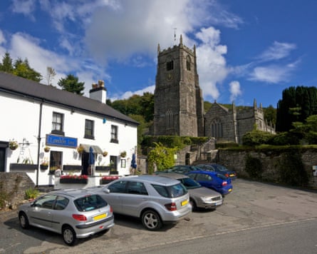 Church and London Inn and some cars