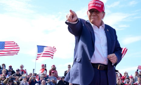 presentation of the candidates meaning Republican presidential candidate former President Donald Trump gestures to the crowd at a campaign rally Saturday, March 16, 2024, in Vandalia, Ohio. (AP Photo/Jeff Dean)