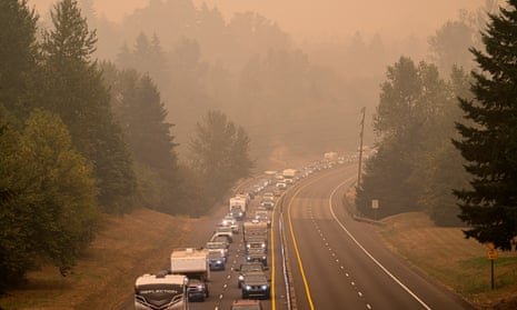 Oregon residents evacuate north along route 213. The state is grappling with wildfires the size of which it has not seen before.