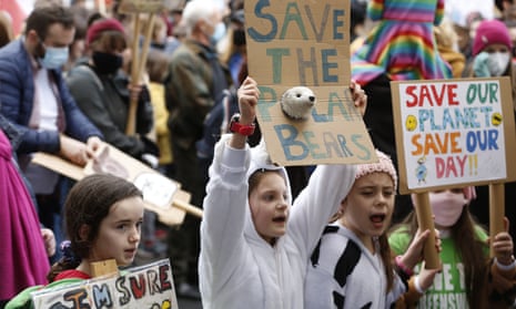 Schoolchildren at a Fridays For Future climate march in Glasgow