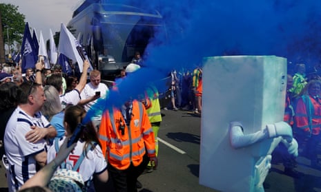 West Brom's mascot and fans welcome the team bus