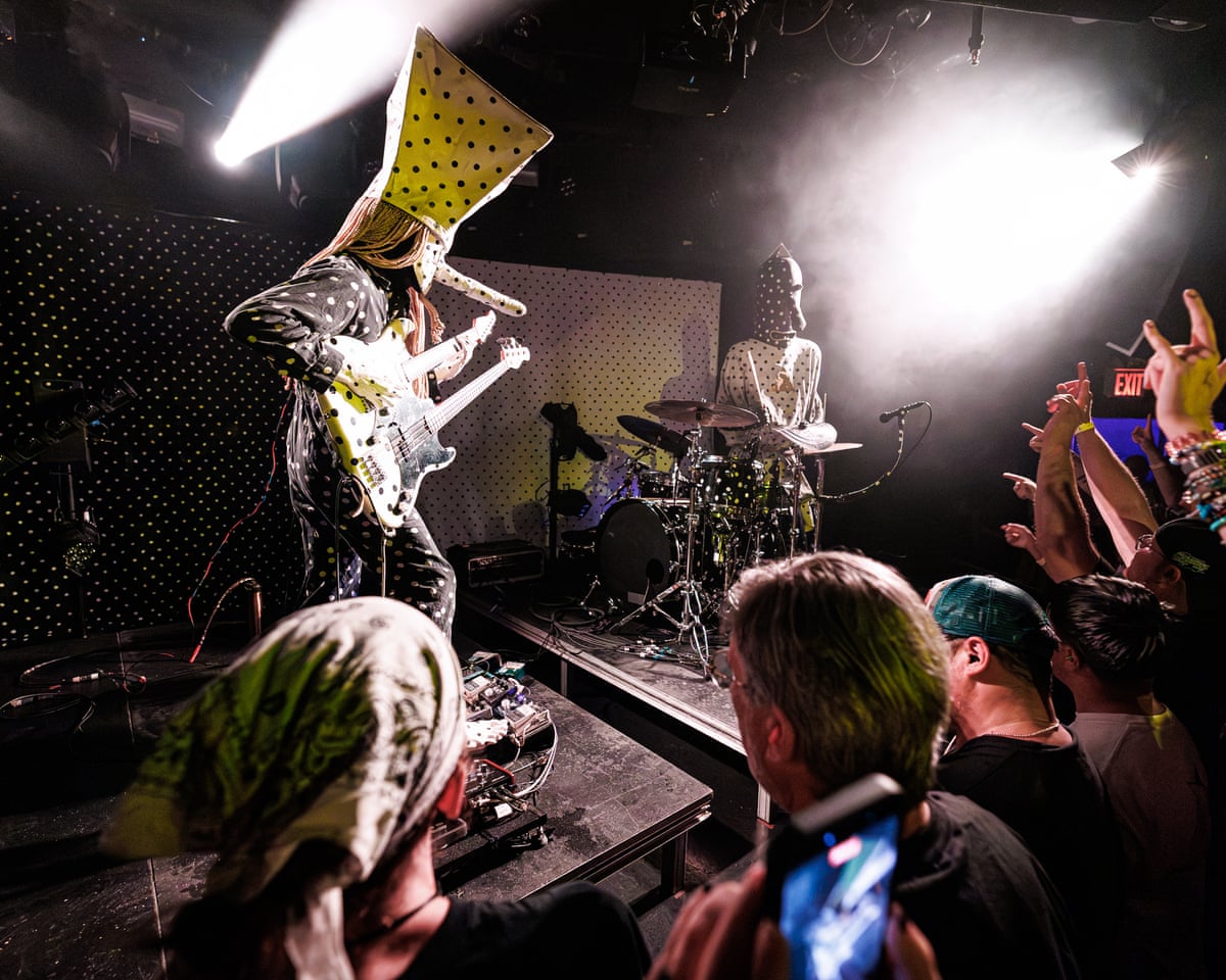 Masked band performing live