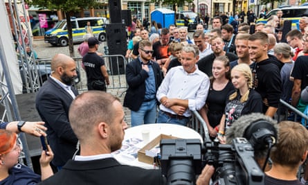 Björn Höcke with supporters after addressing an election rally in Apolda.