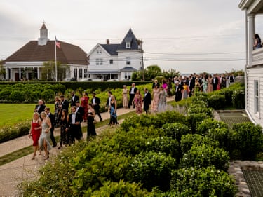 Wedding Parade In Watch Hill, near Newport, Rhode Island, there lies a well-established seaside community where many of the same families continue to gather each summer, as their parents and grandparents did before them. Vogt’s images offer an intimate insider’s view of this American upper class lifestyle. Here we see a Watch Hill wedding procession making their way from the Chapel to the reception at the Ocean House