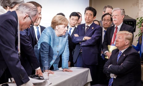 ‘Last weekend Trump got something right.’ Donald Trump, Angela Merkel and other G7 leaders in Quebec, Canada.