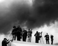 Journalists covering a fire following an overnight airstrike on an oil refinery in Iran last month