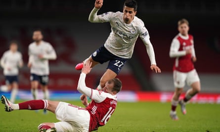 Cancelo is fouled by Rob Holding on one of his marauding runs.