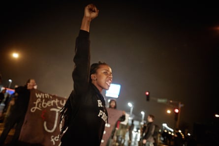 Demonstrators march through the streets while protesting the shooting death of 18-year-old Michael Brown on November 23, 2014 in St. Louis, Missouri. Tensions in Ferguson remain high as a grand jury is expected to decide this month if Ferguson police officer Darren Wilson should be charged in the shooting death of Michael Brown. November 23, 2014