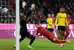 Robert Lewandowski opens the scoring with the first of his two goals in Bayern Munich’s 4-0 win over Borussia Dortmund in November 2019.