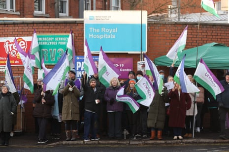 Unison members on a picket line outside the Royal Victoria Hospital in Belfast, where they are on strike today.