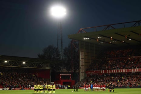 Players observe a minute's silence to honour the victims of the disasters in Libya and Morocco ahead of the Premier League match between Nottingham Forest and Burnley at The City Ground.