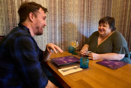 Keith and Amanda chatting across a restaurant table