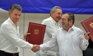 Colombian president Juan Manuel Santos, Cuban president Raúl Castro and Farc commander Timoleón Jimenez attend the signing ceremony in Havana, Cuba.