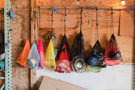 Hanging dishware and utensils in mesh bags