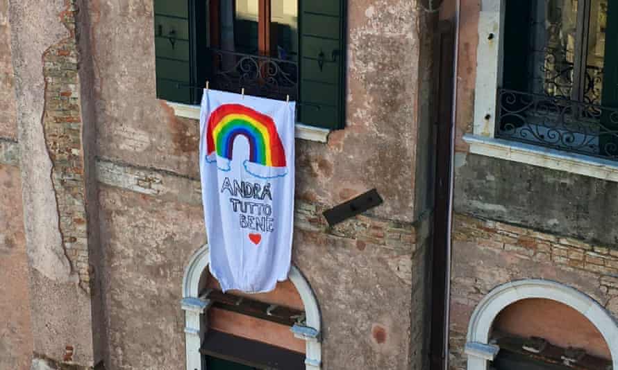A banner hanging from a window in Venice.