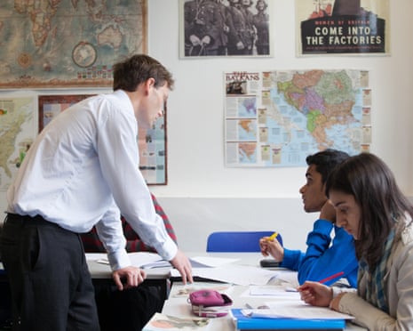 Teacher at a further education college teaching in a classroom