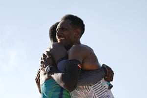 The men hug