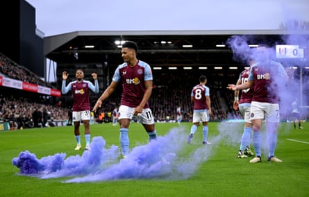 17 February 2024Ollie Watkins of Aston Villa disperses flares after a goal against Fulham at Craven Cottage. Villa won 2-1.