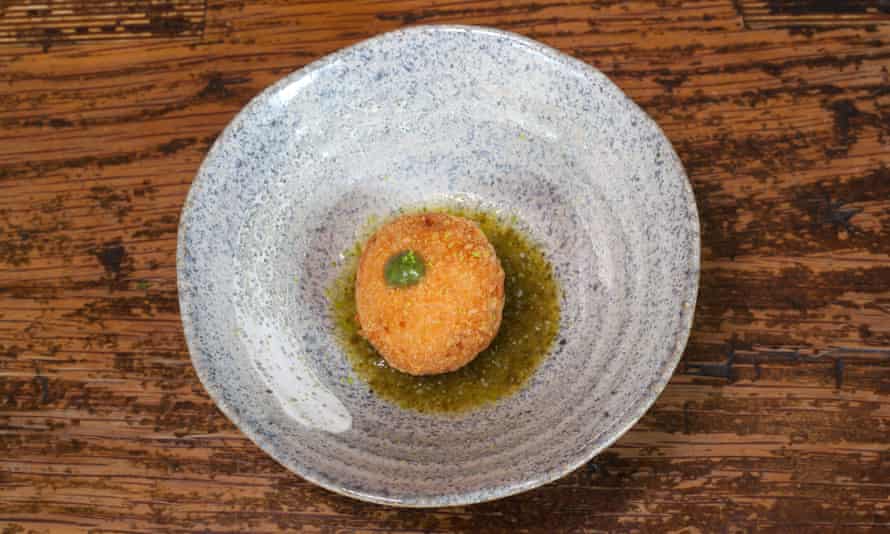 'Sitting in a thick green pond with sweet and sour Nam Jim sauce': Crab croquette.