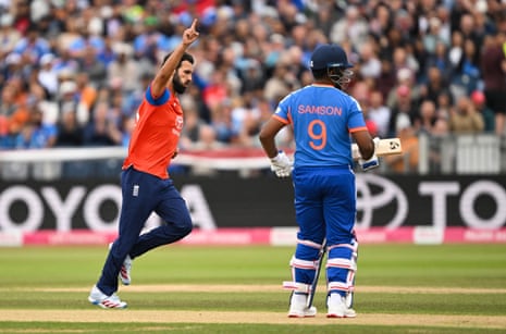 Saqib Mahmood celebrates taking the wicket of Sanju Samson.