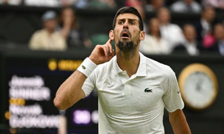 Novak Djokovic gestures to the Centre Court crowd in reaction to their audible support for his opponent, Jannick Sinner