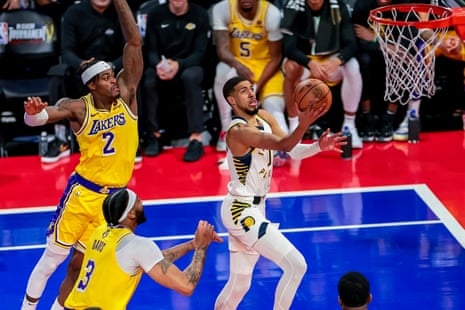 The Pacers’ Tyrese Haliburton has been harried by the Lakers’ defense all night.