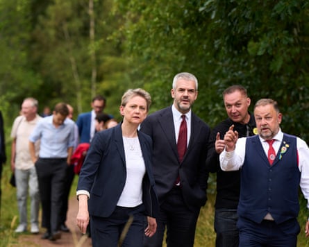 Yvette Cooper, the mayor of South Yorkshire Oliver Coppard, Joe Rollin from the Orgreave Truth and Justice campaign and and the president of the National Union of Mineworkers, Chris Kitchen at the site of the former Orgreave coking plant.