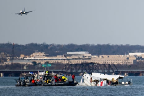 In this image provided by the U.S. Coast Guard, wreckage is seen in the Potomac River near Ronald Reagan Washington National Airport, Thursday, Jan. 30, 2025, in Washington.