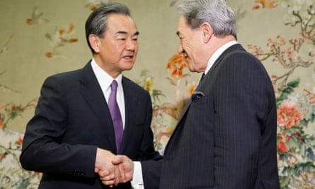 China’s foreign minister Wang Yi greets New Zealand counterpart Winston Peters in Beijing in May.