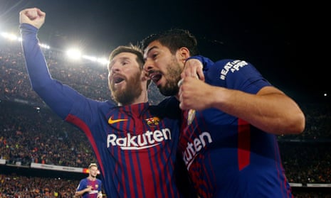 Leo Messi and Luis Suarez celebrate.