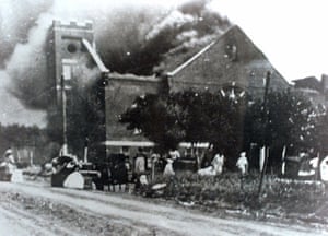 Mt. Zion Baptist Church burns after being torched by white mobs during the 1921 Tulsa massacre