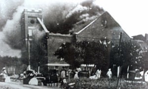 Mt Zion Baptist church burns after being torched by white mobs during the 1921 Tulsa massacre.