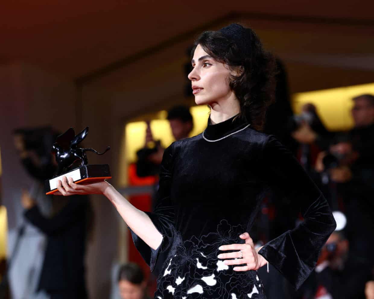 Laleh Marzban with the Orizzonti best actress award for Falling House at the closing ceremony of the Venice film festival.