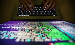 A programer shows a sample of decrypting source code in Taipei, Taiwan