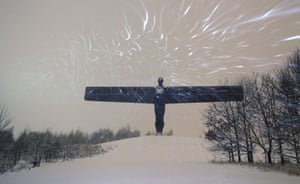 Snow surrounds the Angel of the North in Gateshead