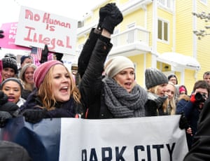 Chelsea Handler and Charlize Theron participate in the Women’s March on Main Street Park City in Utah