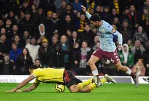 Deeney goes down under the challenge of Douglas Luiz.