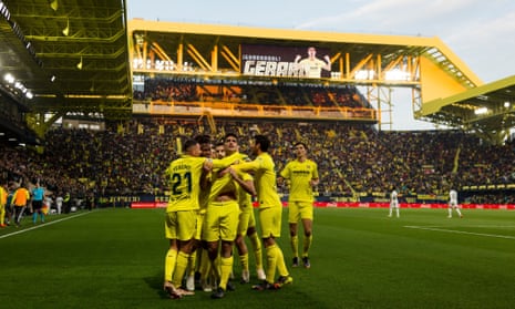 Villarreal's Gerard Moreno is congratulated after putting his team 2-1 ahead against Real Madrid.