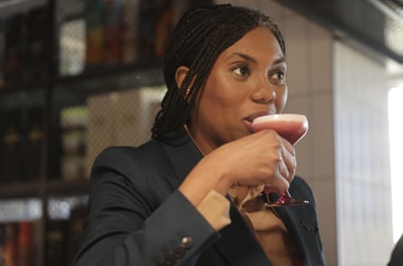 Kemi Badenoch drinks from a cocktail during a visit to the Johnnie Walker Experience