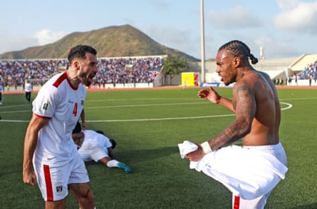 Roberto Lopes, left, and Garry Rodrigues look overjoyed.
