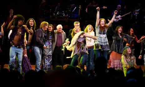 Galt MacDermot is surrounded by the cast of a 2009 Broadway revival of Hair 