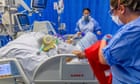 'Know you are loved': hope and tragedy in NHS hospital as Covid vaccine launched