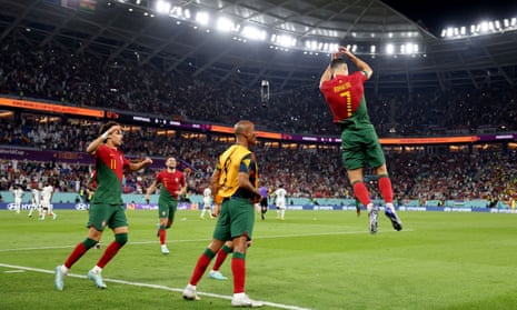 Cristiano Ronaldo leaps into the air in celebration after his penalty puts Portugal 1-0 ahead against Ghana