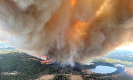 British scientists are concerned that the real effects of the climate crisis, such as this wildfire in Alberta, Canada, earlier this month, are not reaching the public.